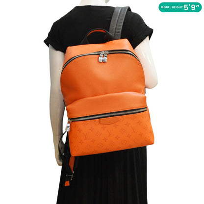 LOUIS VUITTON Discovery Taiga leather Backpack Orange