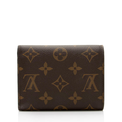 Louis Vuitton Monogram Canvas Victorine Wallet (SHF-4K4u4K)