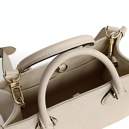 LOUIS VUITTON Louis Vuitton Louis Vuitton OnTheGo Empreinte PM shoulder bag in ivory leather