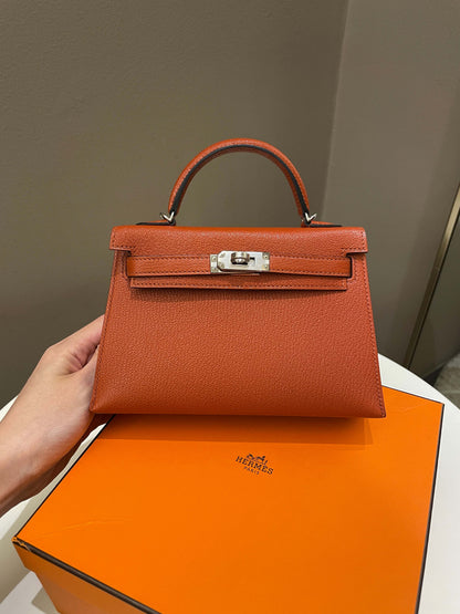 Hermes Mini Kelly 20 Cuivre Chèvre / Rose Mexico