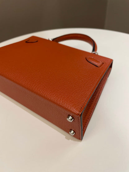 Hermes Mini Kelly 20 Cuivre Chèvre / Rose Mexico