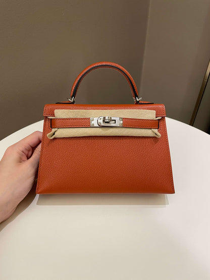 Hermes Mini Kelly 20 Cuivre Chèvre / Rose Mexico