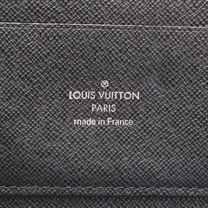 Louis Vuitton  Taiga Leather Continental Wallet