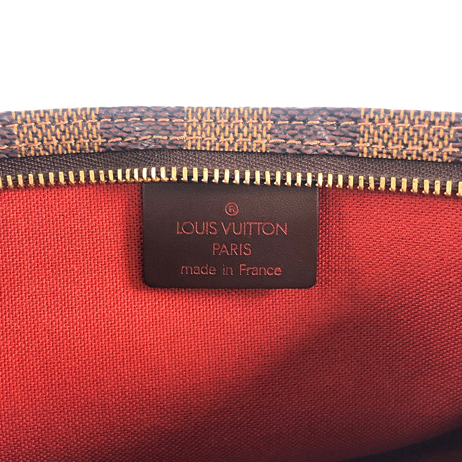 Louis Vuitton  Attached strap missing item Optional shoulder strap included Pouch