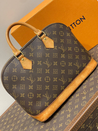 Louis Vuitton - Sac Alma PM monogramme