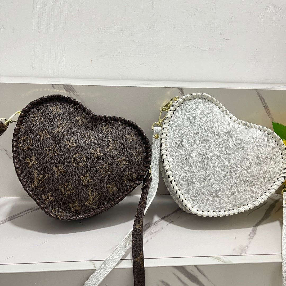 Louis Vuitton / Coach handbags