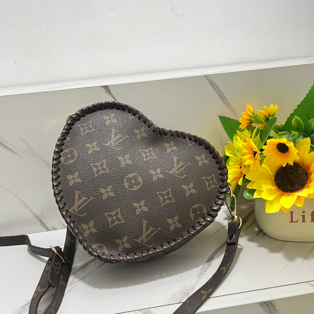 Louis Vuitton / Coach handbags